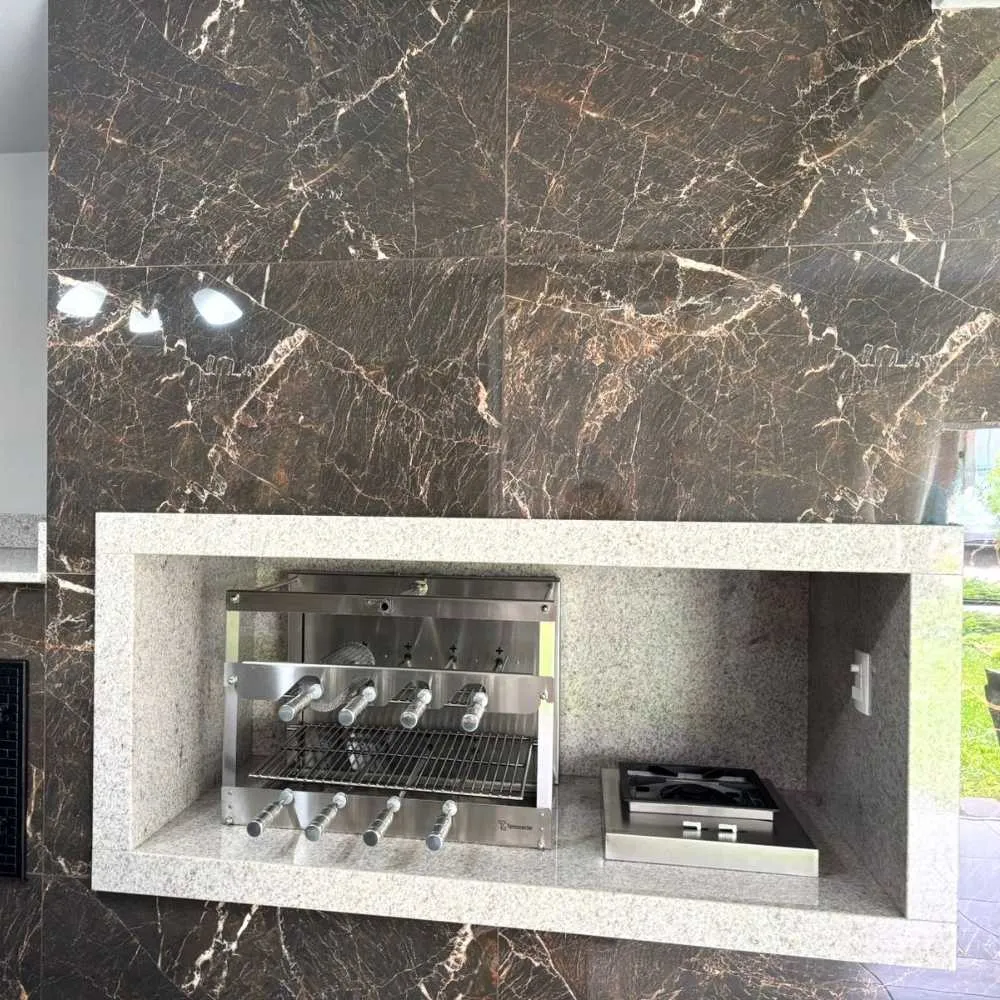 Churrasqueira giratória em inox com manivela